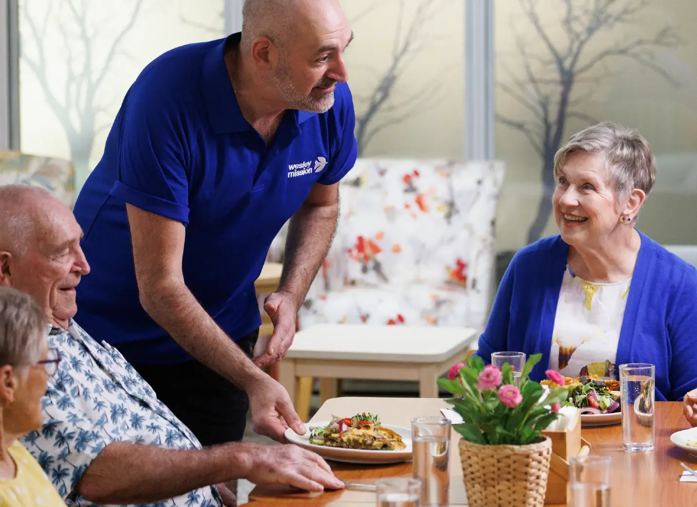 Retirement-Living-Staff-Member-Speaking-With-Customers